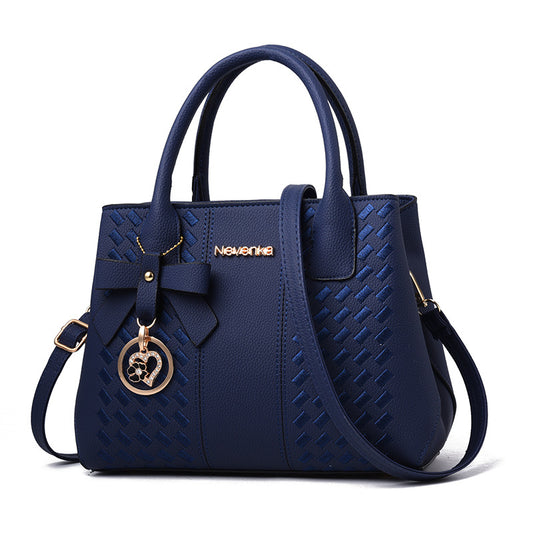 Casual luxury handbag with bow embroidery